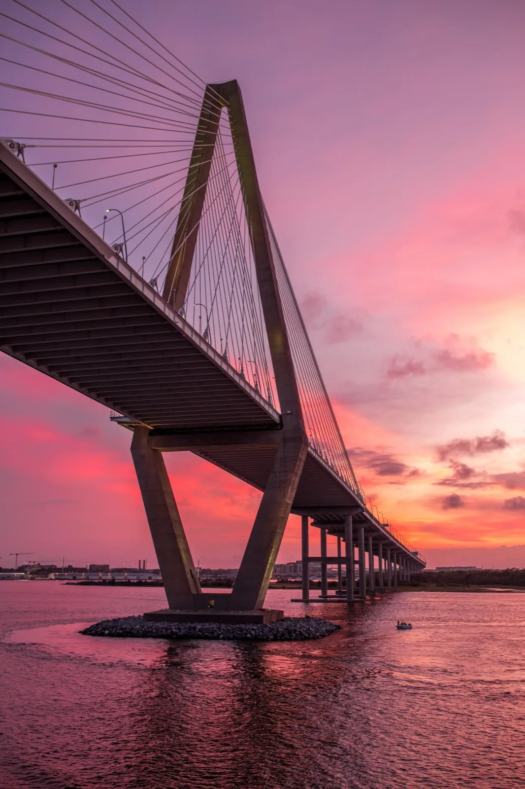 The Arthur Ravenel Jr. Bridge at sunset over Charleston Harbor